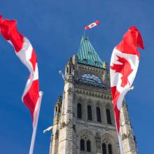 Canadian flags and Parliament